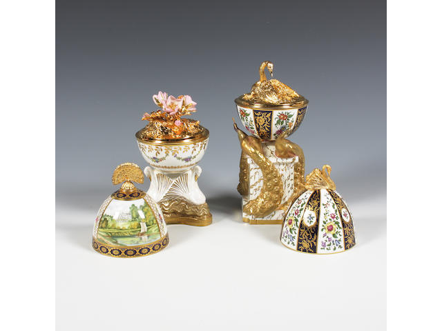 Two Royal Worcester limited edition silver gilt and porcelain models 'The Swan Egg' and 'The Peacock Egg' Dated 1984 and 1985