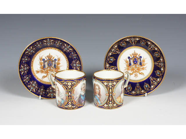 A pair of S&#232;vres-style coffee cans and saucers Late 19th Century.