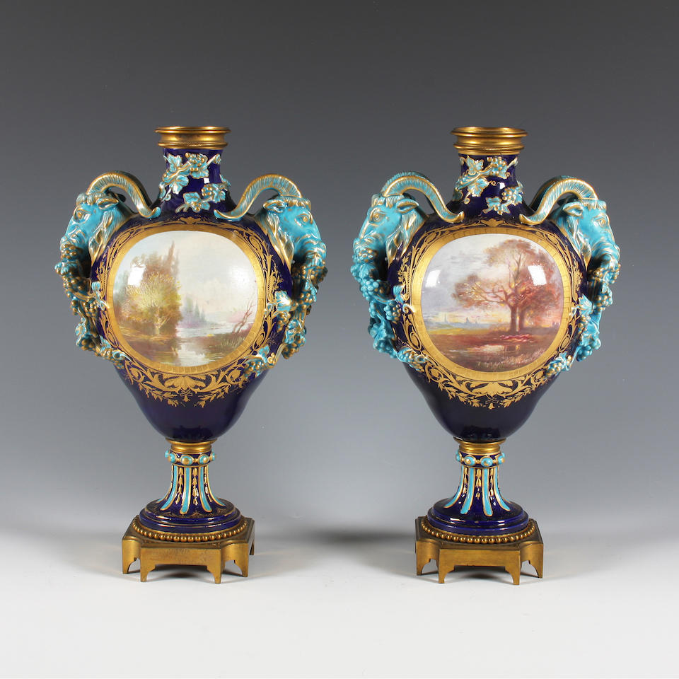 A pair of S&#232;vres style gilt metal mounted vases Late 19th Century.