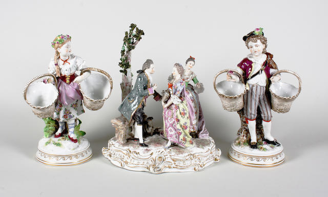 A large pair of Dresden figures of pastoral children and a figure group Early 20th Century.