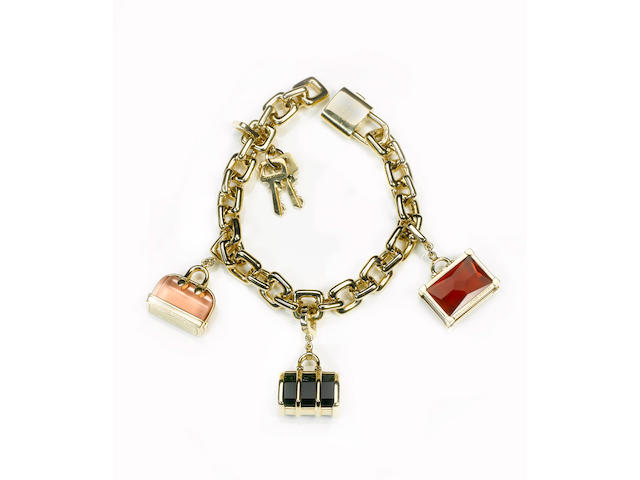 An eighteen karat gold charm bracelet, Louis Vuitton
