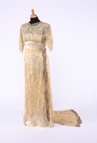 Bonhams : An early 20th century tamboured lace and cream satin wedding ...