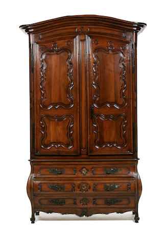 A Louis XV provincial walnut armoire en cabinet