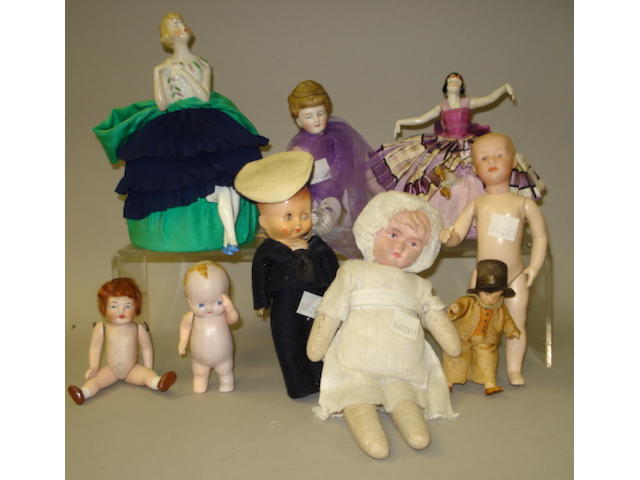 Collection of various small dolls, including half dolls lot