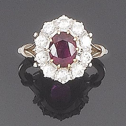 A ruby and diamond cluster ring