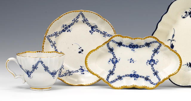 A Caughley cup and saucer and a matching spoon tray Circa 1785-90.