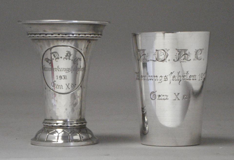 A circa 1912 ADAC full member's enamel lapel badge and two later ADAC silver cups,