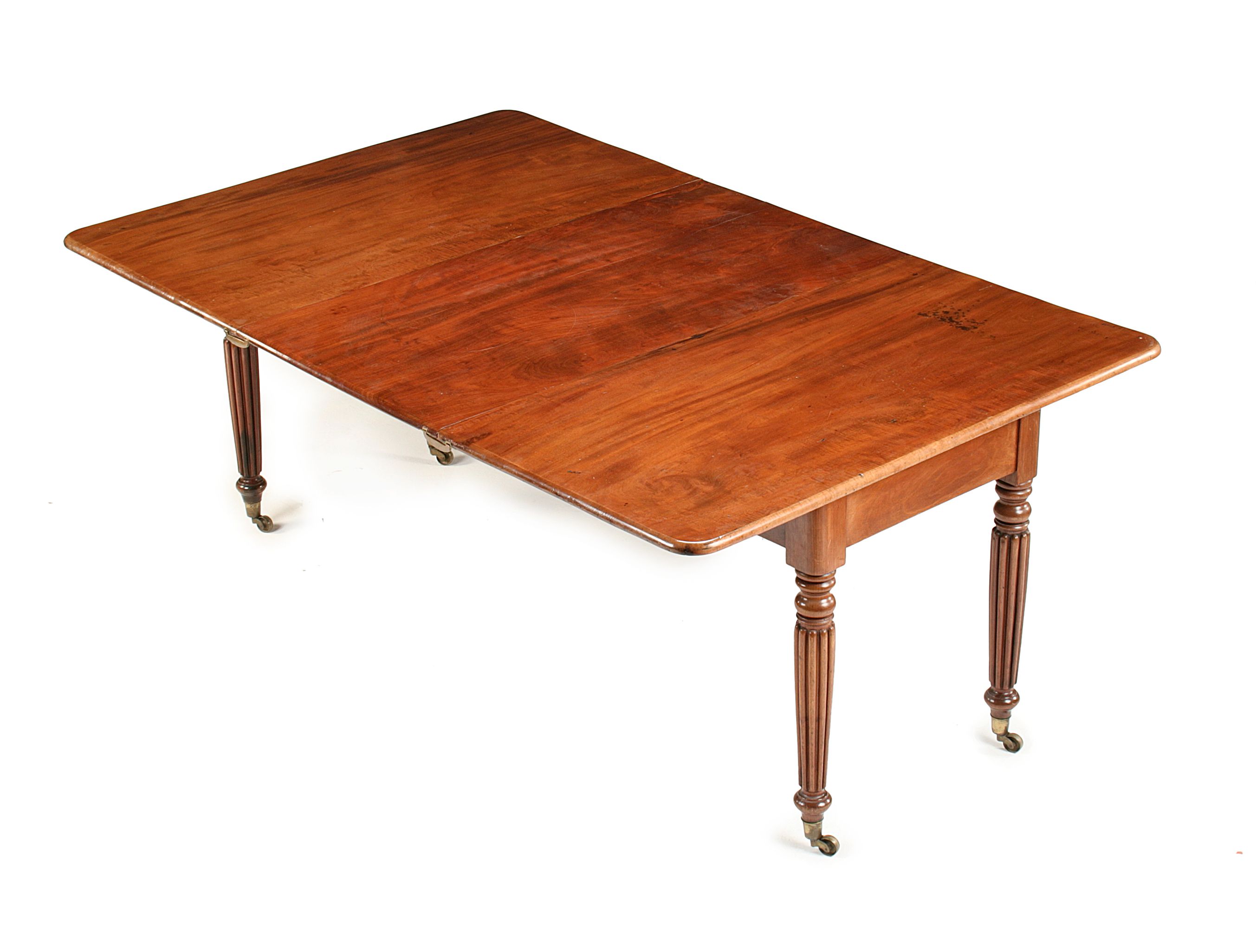 A Regency mahogany metamorphic dining table