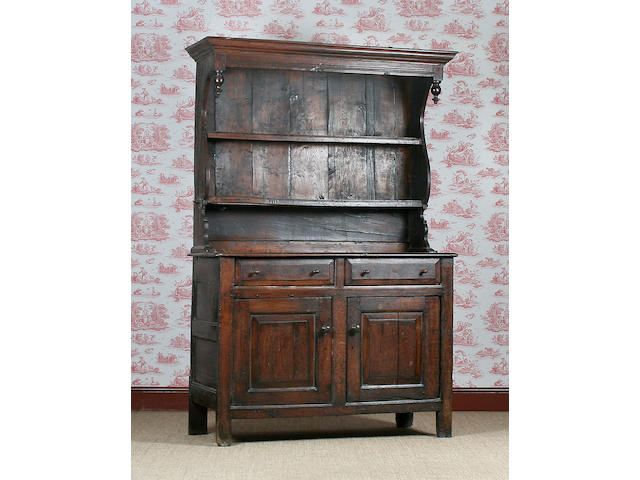 A small early 18th Century oak canopy dresser, North Wales