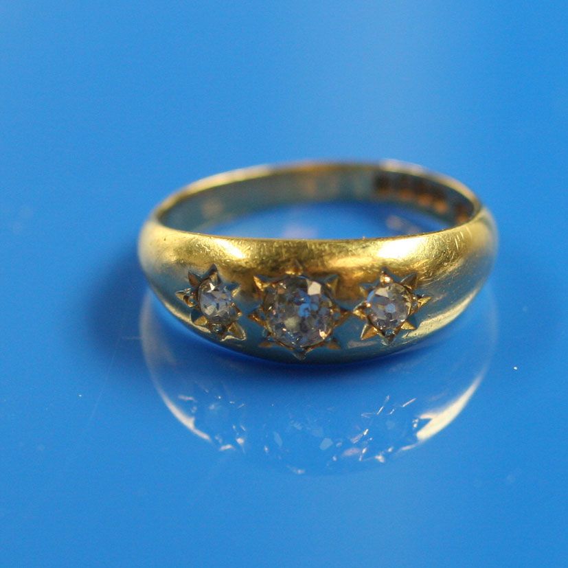 A three stone diamond ring