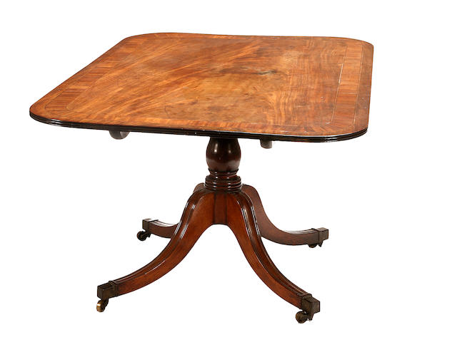 A late George III mahogany breakfast table,