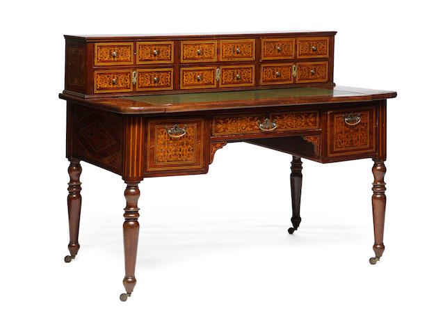 A Victorian mahogany and marquetry inlaid desk