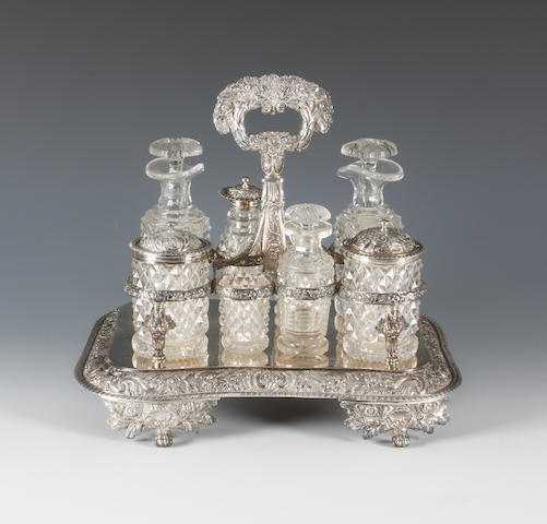 A George III silver eight bottle cruet stand Maker's mark 'A.K', London 1819,