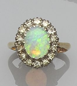 An opal and diamond cluster ring