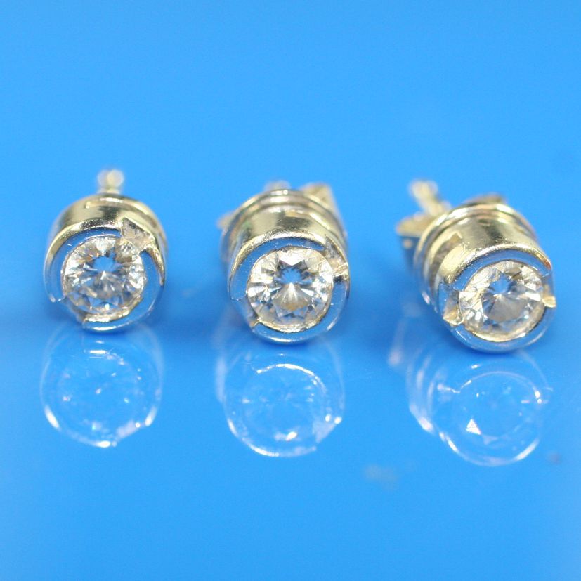 Three single diamond earstuds
