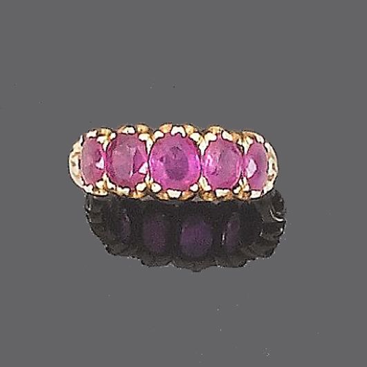 A ruby five-stone ring