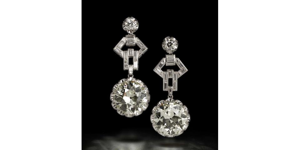 An impressive pair of diamond pendent earrings,