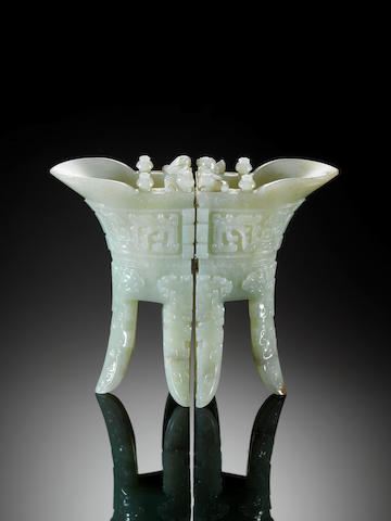 An important and rare pair of archaistic pale celadon jade wine vessels, jue Incised Qianlong four-c
