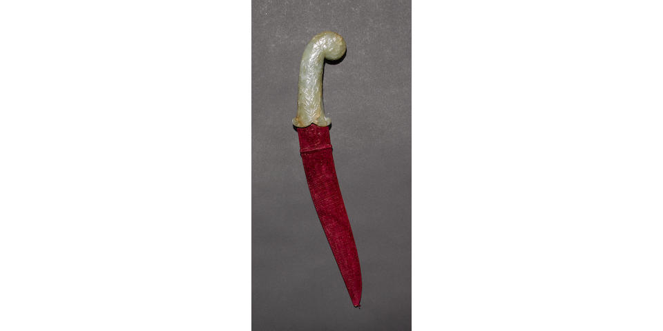 A Mughal-Jade handled dagger with typical curved blade and scabbard 18th century