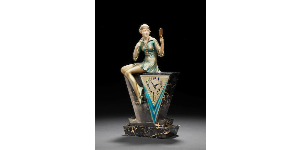 Ferdinand Preiss 'Powder Puff' a rare Art Deco cold-painted bronze and carved ivory Figural Clock, circa 1925