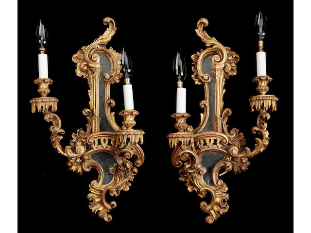 A pair giltwood Chippendale revival two light wall sconces