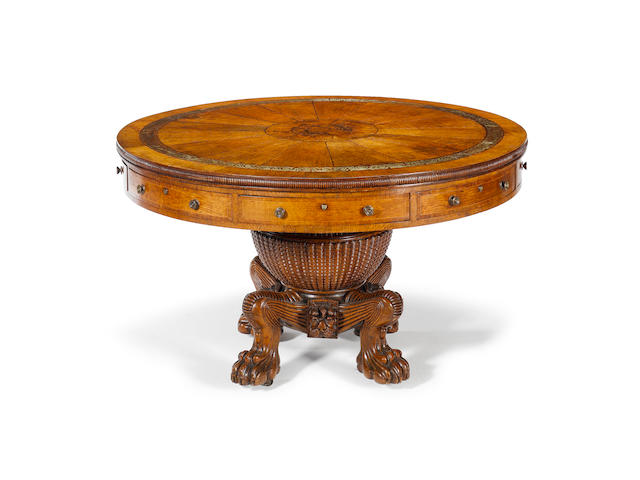 A good Regency figured oak drum library table of unusual design, possibly Scottish