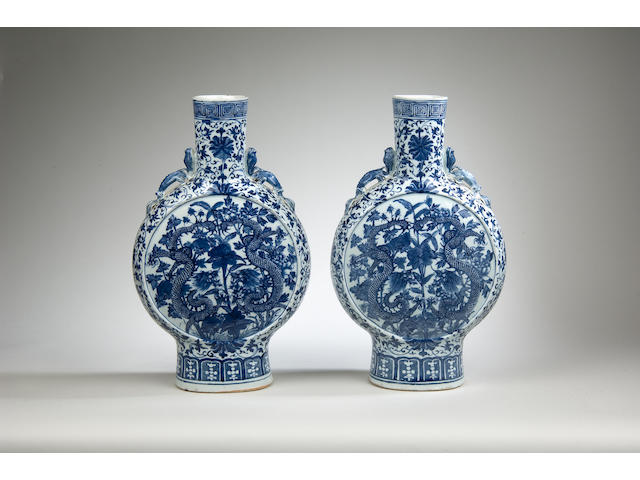 A fine pair of Chinese blue & white moonflasks, Qing dynasty, 19th Century in date,