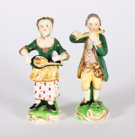 A pair of small figures of musicians 19th Century.