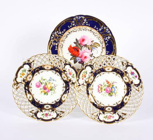 A Coalport plate and a pair of Minton plates Circa 1830 and early 20th Century.
