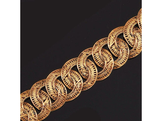 An openwork bracelet and necklace suite