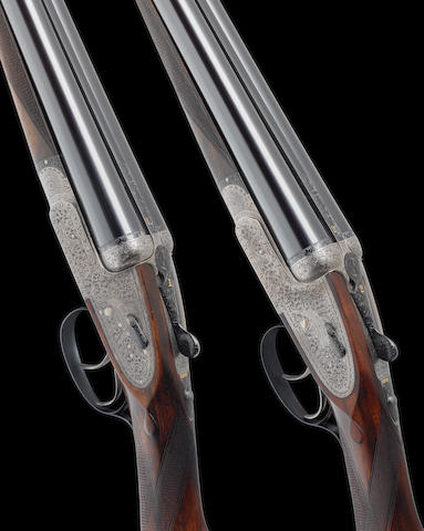 A composed pair of 12-bore 'Royal Brevis' self-opening sidelock ejector guns by Holland & Holland, no. 33492/295 In a Holland & Holland leather case