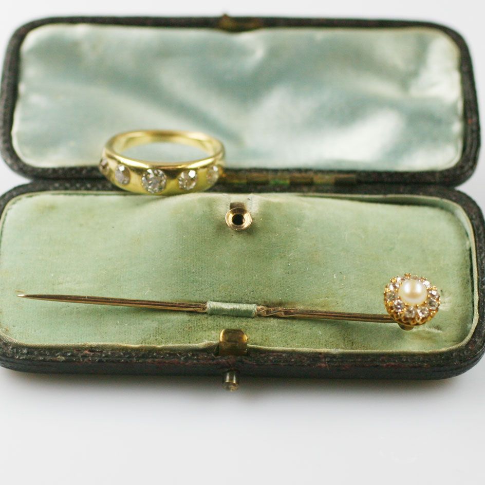 A diamond five stone ring