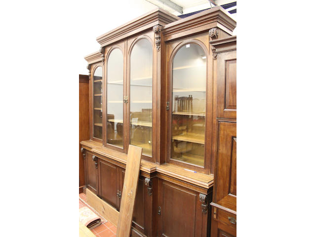 A late Victorian oak breakfront library bookcase,