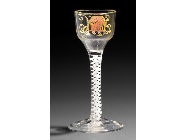 A Beilby enamelled opaque-twist wine glass from the Horsley Service circa 1765