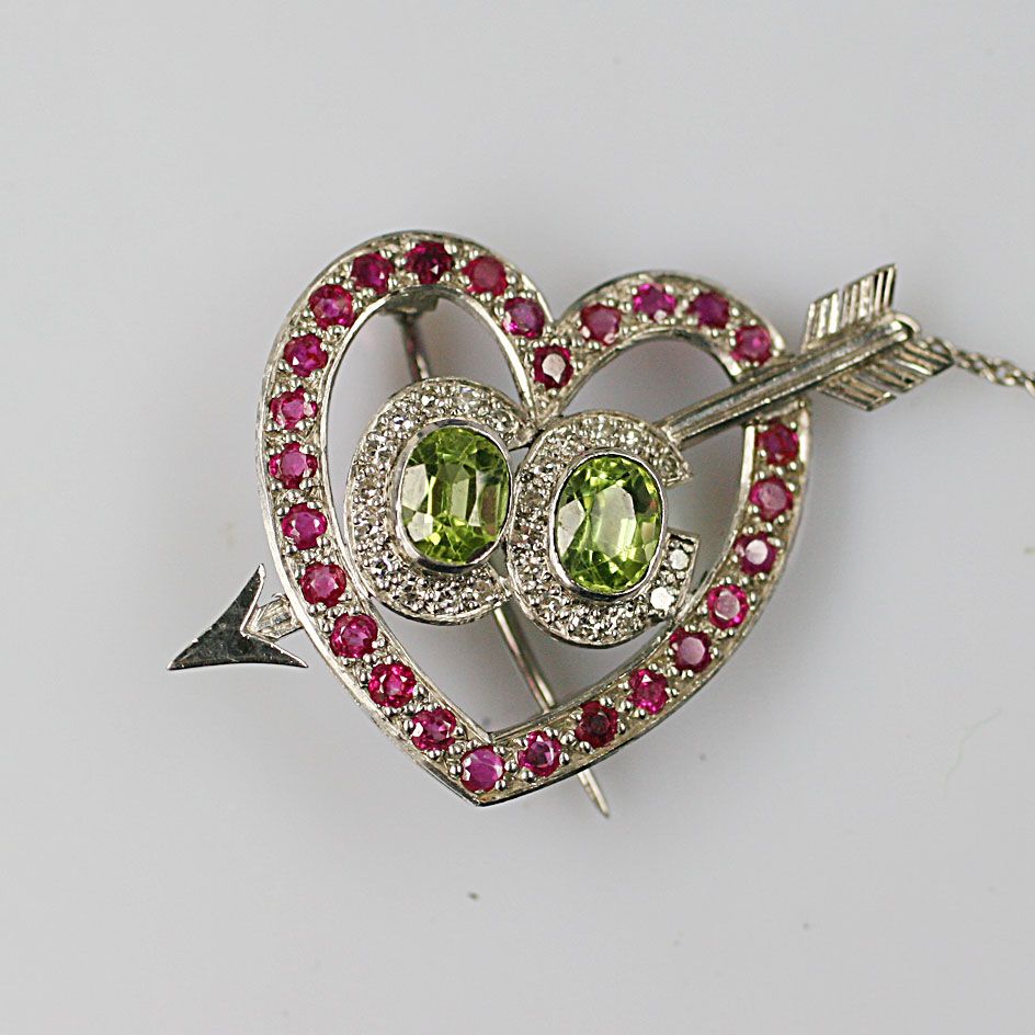 A multi gem set sentimental brooch,