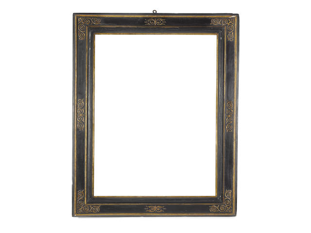 An Italian late 16th Century ebonised and parcel gilt cassetta frame