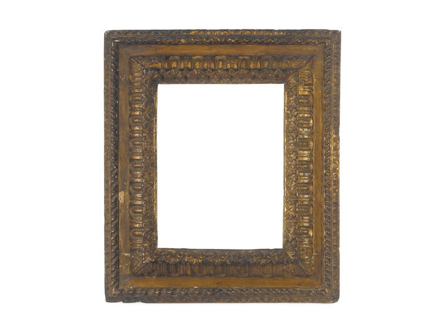 An Italian late 16th/early 17th Century carved and gilded frame