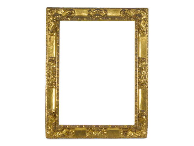 A Spanish 18th Century carved and gilded frame