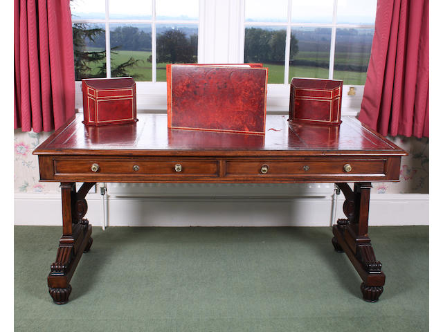 A William IV classical design mahogany library writing table