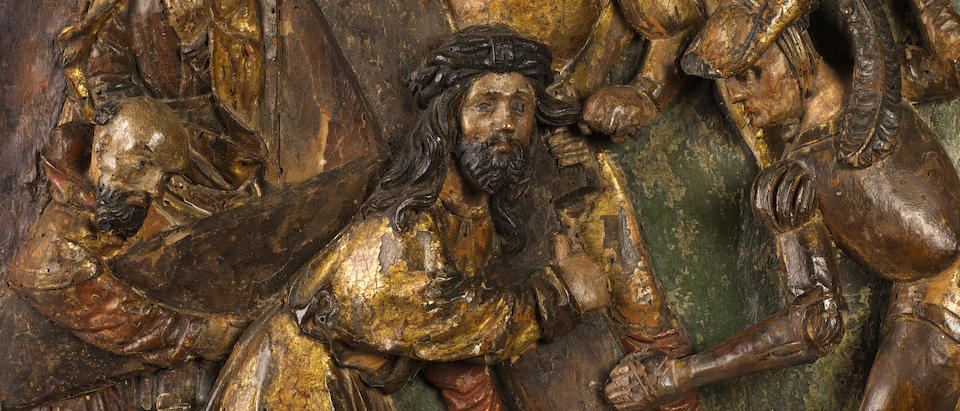 A late Medieval / Early Renaissance South German carved wood and polychrome decorated relief panel depicting Christ on the road to Calvarycirca 1500-1520