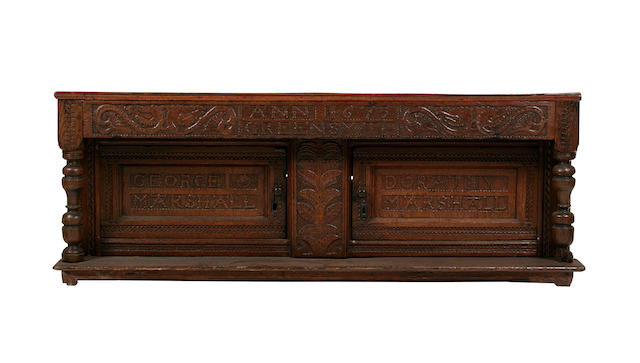 The upper section of a rare named 17th century North Country oak court cupboard