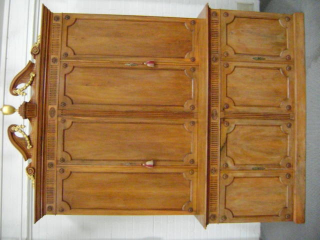 A George III style walnut library cabinet,
