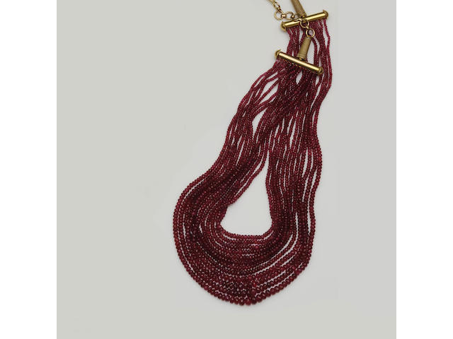 A multi strand red spinel bead necklace