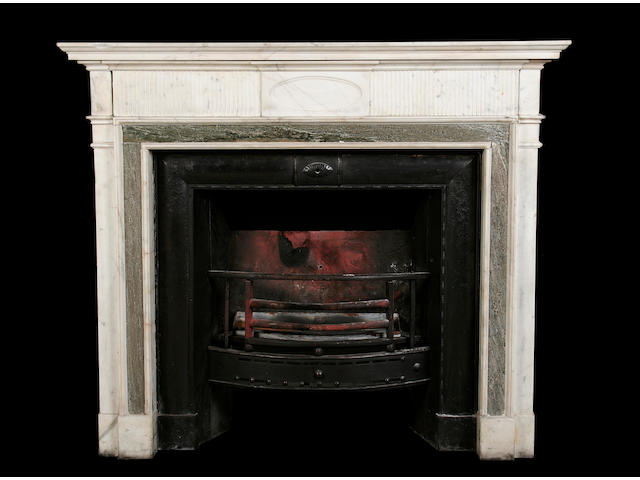 A 19th century English carved white and Swedish green marble chimneypiece
