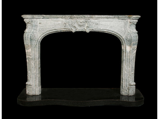 A large mid 18th century style Campan Green marble chimneypiece