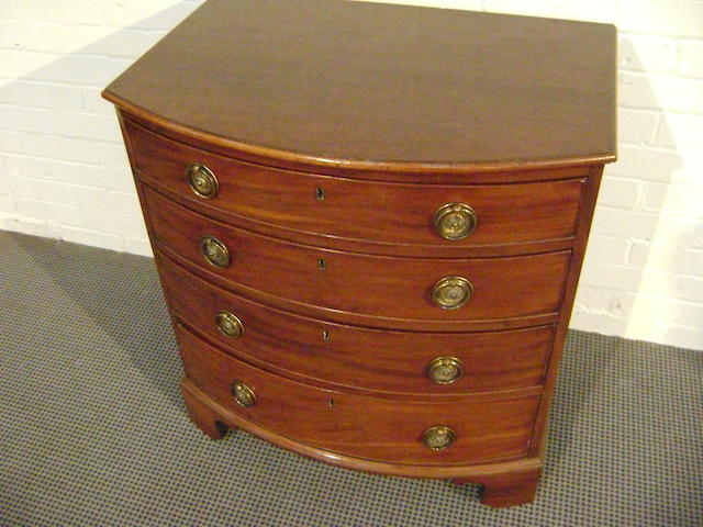 A Regency small bow front chest,