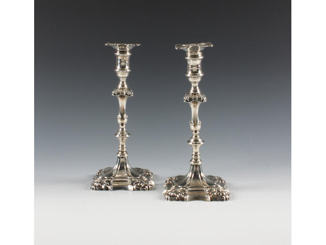 A pair of George III silver candlesticks By Ebenezer Coker, London, 1760,