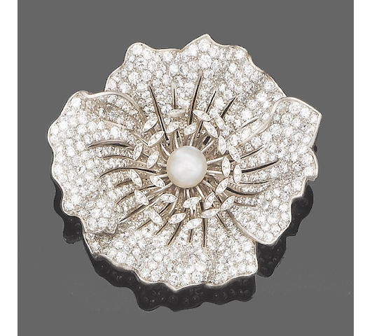 A pearl and diamond brooch