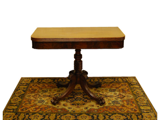 A Regency mahogany fold-over tea table