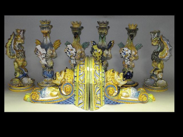 A pair of maiolica wall brackets and six candlesticks.(8)